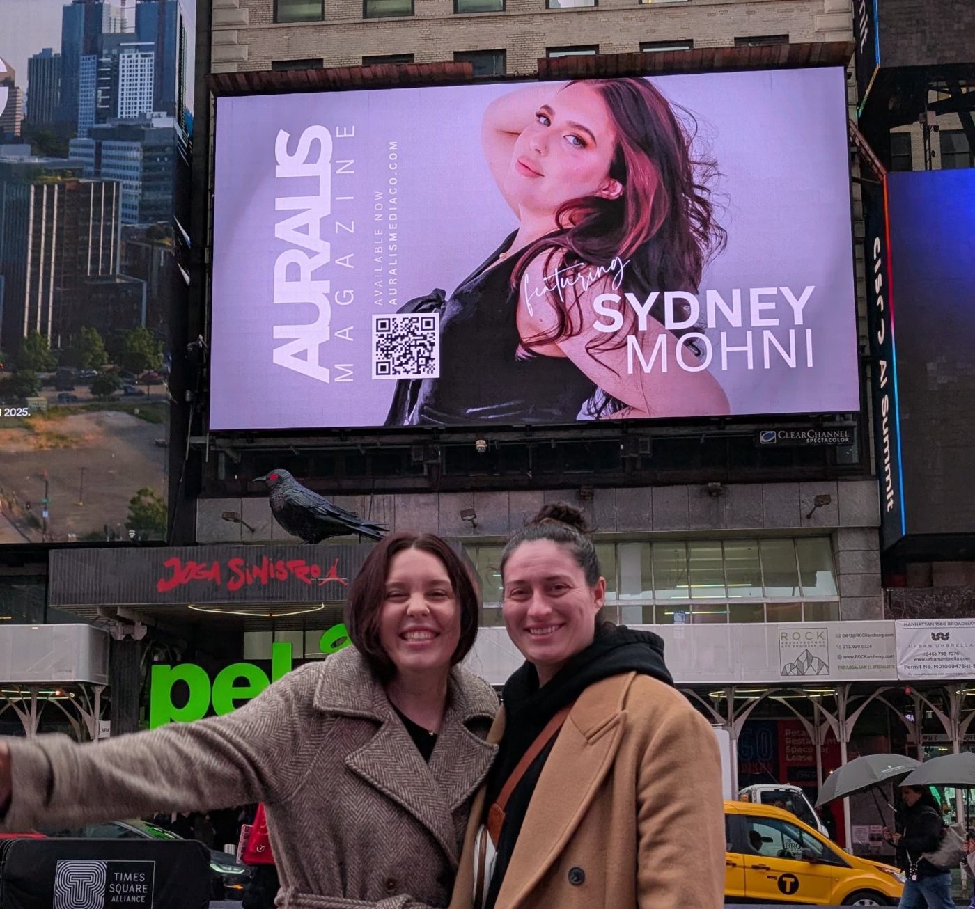 Sydney Mohni's Auralis Magazine feature on a billboard in Times Square
